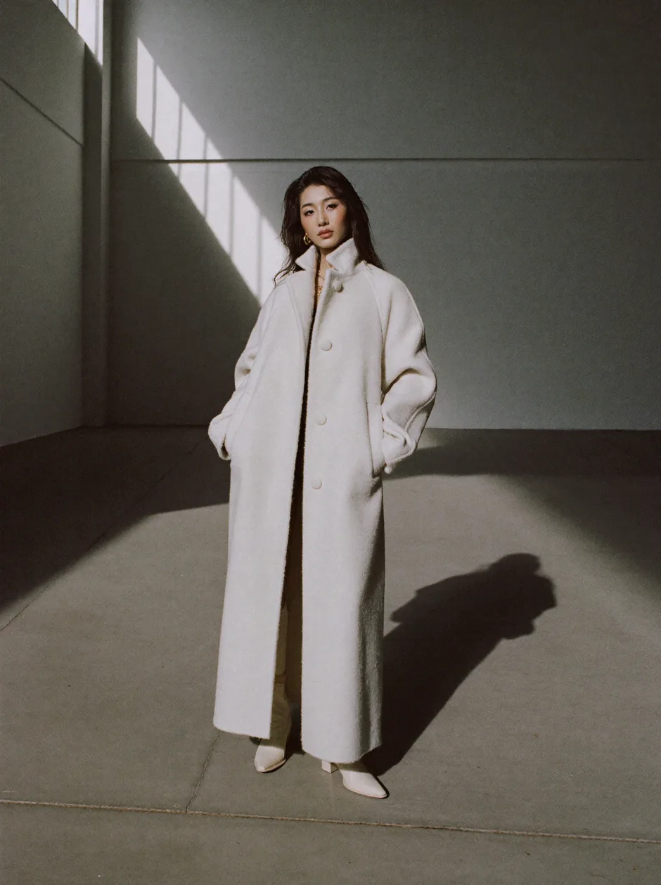 The Cocoon Coat in undyed wool.